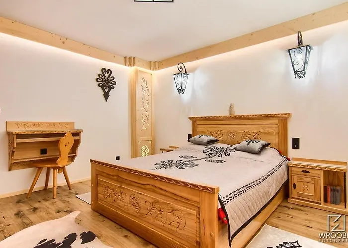 Apartament Zakopane utrzymany w stylu góralskiej chaty